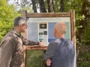 KDIH tour guide Markus Klauer explains one of ten information panels that he helped to create for a walking path on Mort Homme, Verdun, in 2017.